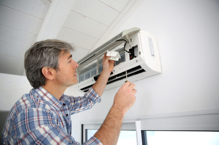 Wall-mounted split-system air conditioner cooling a modern Pretoria living room